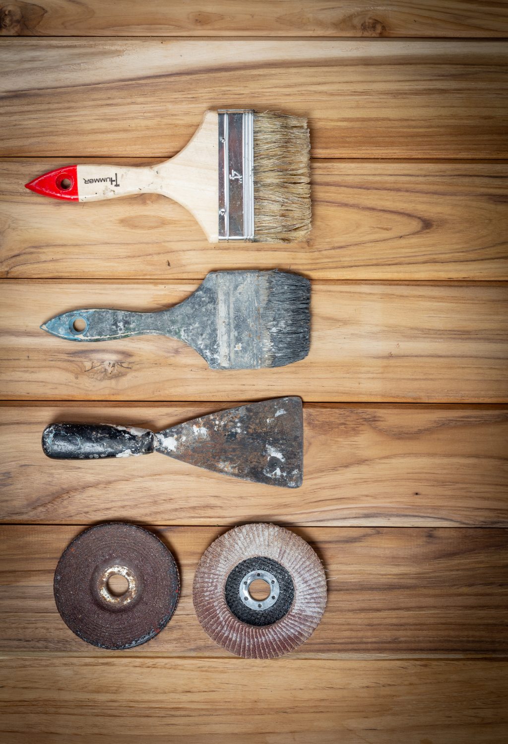 Manual tool set, set on wooden floor.